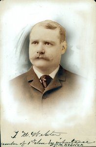 Retrato de busto de Thomas W. Webster con traje y corbata de Dana